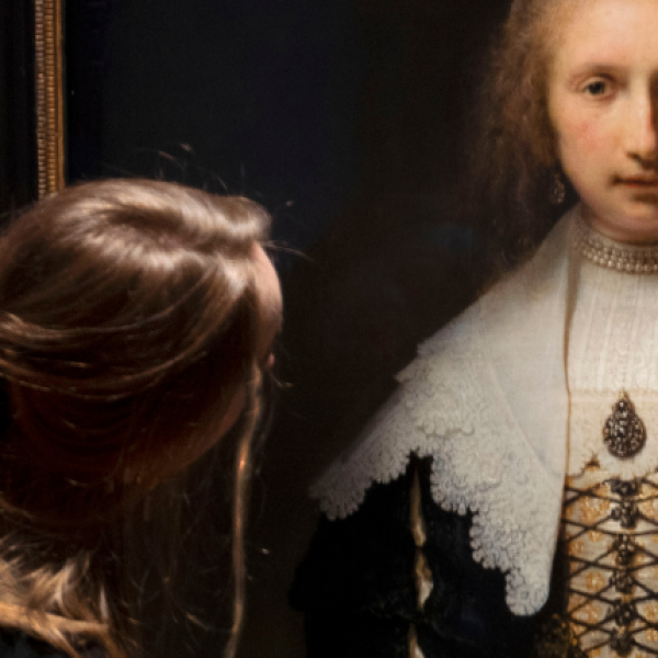 Exhibition curator Isabella Manning examines Rembrandtís ëPortrait of Agatha Basí, one of the most famous paintings in the Royal Collection, ahead of the opening of ëMasterpieces from Buckingham Palaceí at The Queenís Gallery, Edinburgh on Friday, 25 March. David Cheskin Royal Collection Trust.